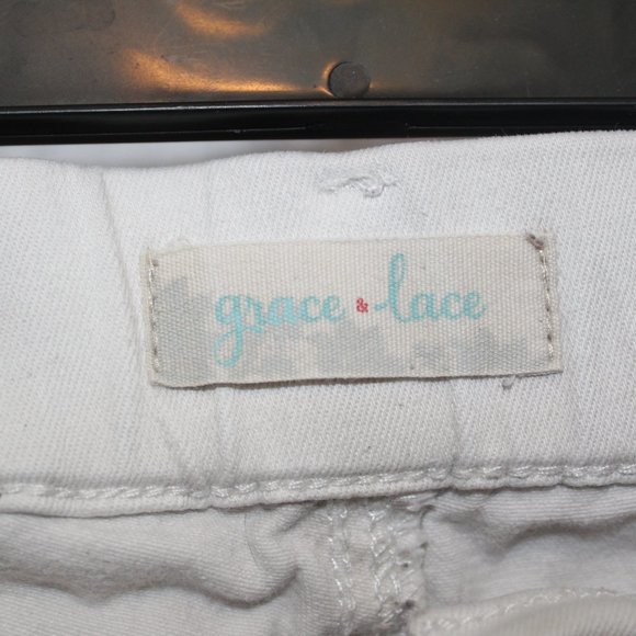 White, distressed, stretchy jeans - Picture 3 of 4